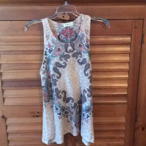 Cute sleeveless top. Nice for summer